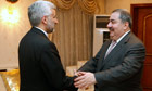 Iraq's foreign minister Hoshyar Zebari (r) welcomes Iran's national security chief Saeed Jalili.
