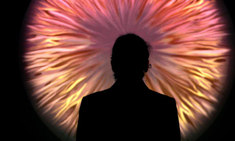 A visitor is silhouetted at the Science Museum