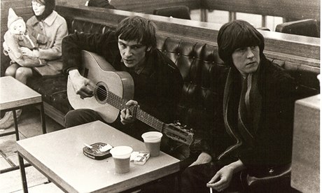 Lal and Mike Waterson in a bar. Mike with guitar
