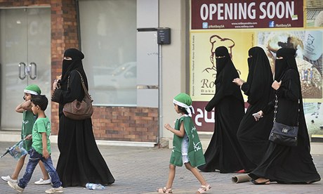 Women and children in Riyadh, Saudia Arabia, where females are not allowed to drive