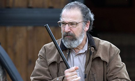Mandy Patinkin as Saul Berenson, with rifle, in Homeland