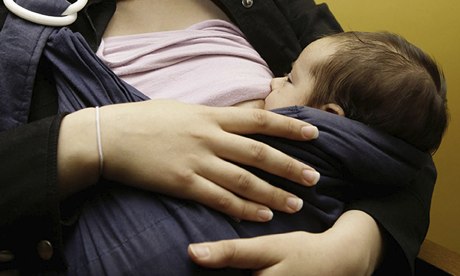 A baby being breastfeed