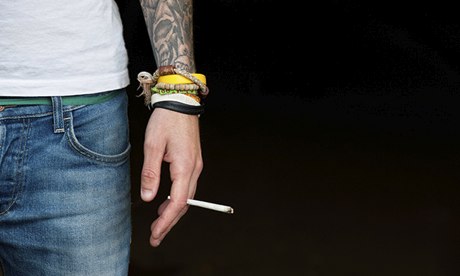 Teenager holding a cannabis joint