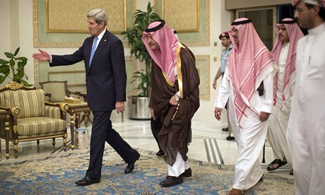 John Kerry, with the Saudi Foreign minister (in brown), Prince Saud al-Faisal bin Abdulaziz Al Saud