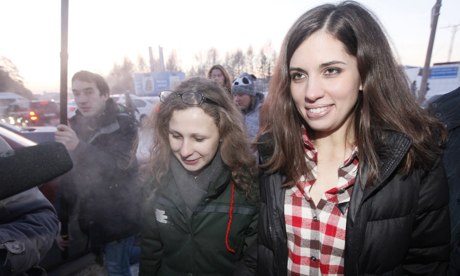 Pussy Riot members Tolokonnikova and Alyokhina outside Yemelyanovo airport in Krasnoyarsk