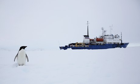 The Akademik Shokalskiy awaits the arrival of the Xue Long, in Antarctica.