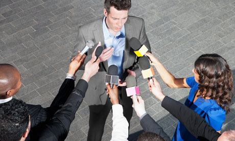 Reporters with microphones