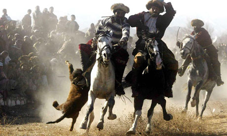 Afghan horsemen play the traditional buzkashi, in Kabul.