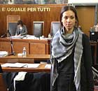 Ruby, real name Karima el-Mahrough, leaves the Milan courtroom after giving evidence.
