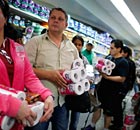 Venezuelans buy toilet rolls