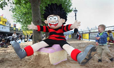 Dennis the Menace in a sand pit outside the Southbank Centre