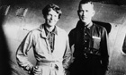 Amelia Earhart and Fred Noonan, her navigator, in front of their twin-engine Lockheed Electra in May