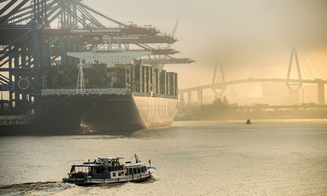 Container ship docks at Hamburg harbour