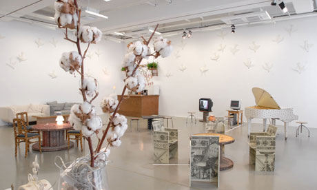 Meschac Gaba's Music Room, including a decorated piano and furniture