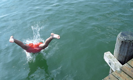 Boy Jumping into Water