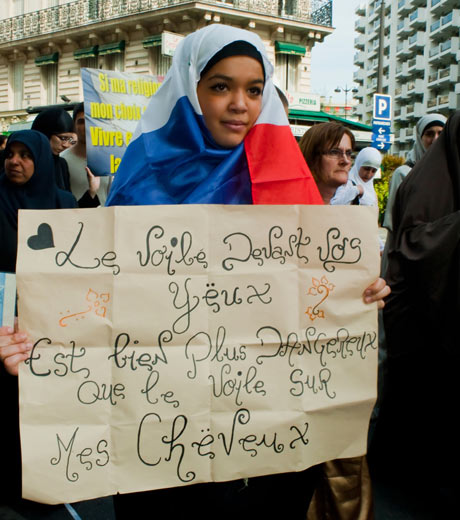 A Muslim woman protesting in Paris