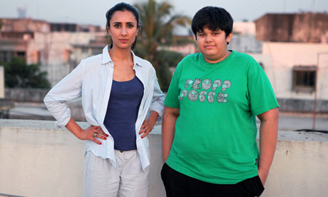 Still from India's Supersize Kids: woman and overweight boy