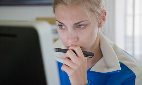 Woman looking at computer screen 