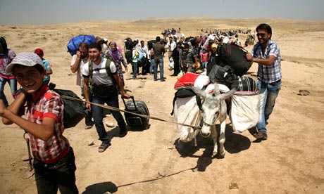 Syrian refugees flee to Iraq