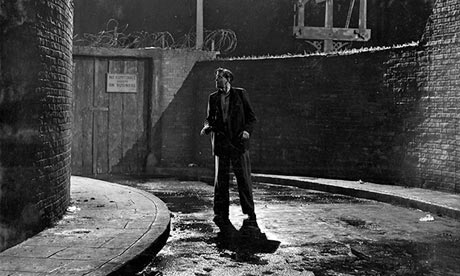 John McCallum as the escaped convict in It Always Rains on Sunday, set in Bethnal Green, London.