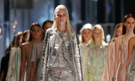 Models present Roberto Cavalli's new work at Milan fashion week