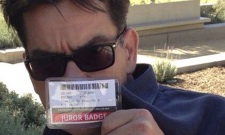 Charlie Sheen and his juror's badge