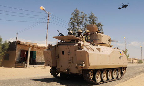 Egyptian soldiers on patrol in northern Sinai