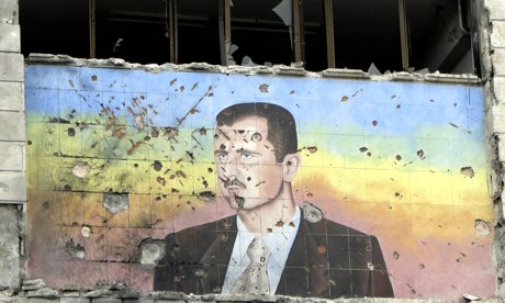 A picture of Bashar al-Assad riddled with holes