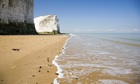 Waves breaking on the beach in Botany Bay Kent