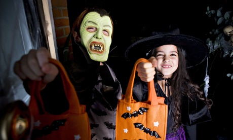 Child dressed as Dracula at a Halloween part
