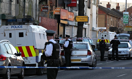 Police patrol Springfield Road, West Belfast