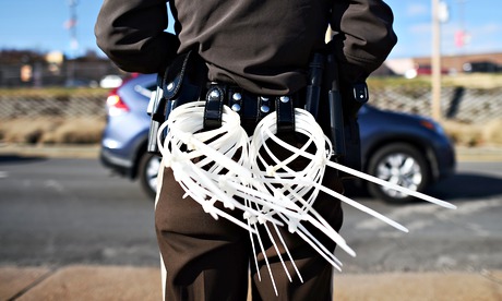 Police officer guard Michael Brown riot