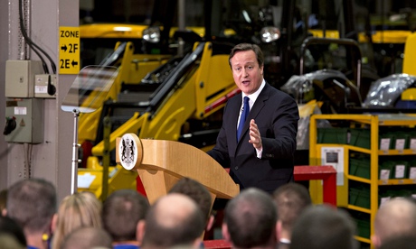 David Cameron gives speech with JCB diggers in background