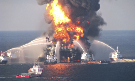 Boat response crews battling the blazing remnants of the offshore oil rig Deepwater Horizon