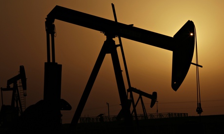 Oil pumps at sunset in Sakhir, Bahrain