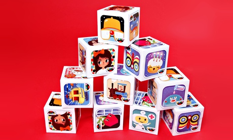 Pile of paper cubes with different images from Toca Boca apps on each face