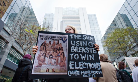 Anti-Page 3 campaigner holds placard