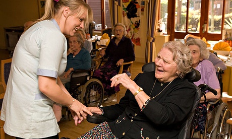 Member of care staff with elderly resident at a care home in Isleworth, Middlesex