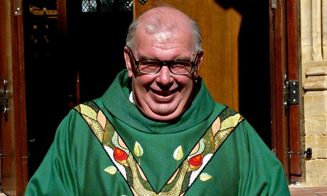 Fr John Olliver in front of All Saints in Oxted, where he was the parish priest in later life