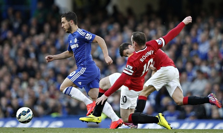 Eden Hazard evades a challenge from Wayne Rooney while proving the difference between Chelsea and Ma
