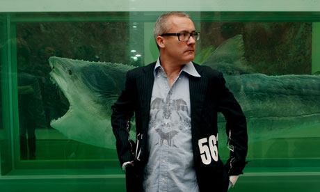 Damien Hirst with his work Death Explained