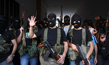 Shia masked gunmen from the Meqdad clan gather in the southern suburbs in Beirut