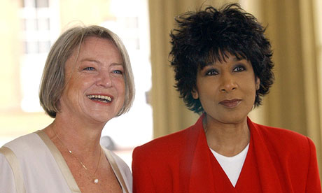 Kate Adie with fellow news-broadcaster Moira Stewart at Buckingham Palace in 2004 