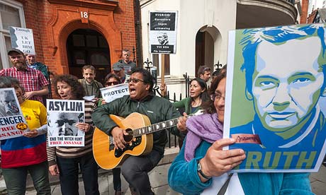 Julian Assange's supporters at the Ecuadorean embassy on the anniversary of him taking refuge there