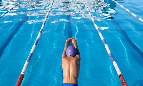 Boy Diving into Swimming Pool