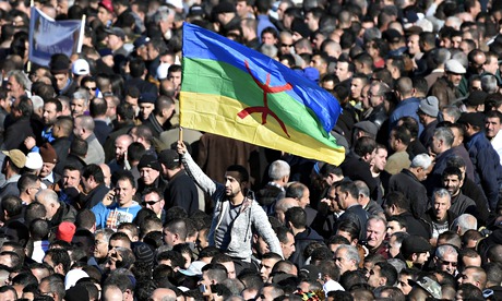 Man waves Amazigh flag