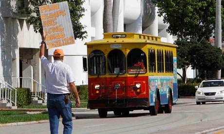 A man protests against pill mills in Fort Lauderdale. 98% of doctors who prescribe oxycodone work in Florida, and Americans travel far to get the drug – many arriving on the ‘Oxycodone Express’. Photograph: Alan Diaz/AP