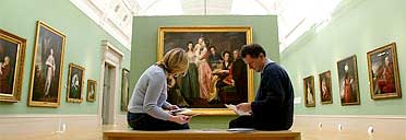 Curator of the Romney show, Alex Kidson (right), in the refurbished Walker Art Gallery