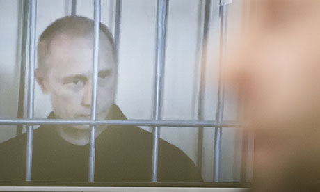 Putin seen behind bars in spoof video