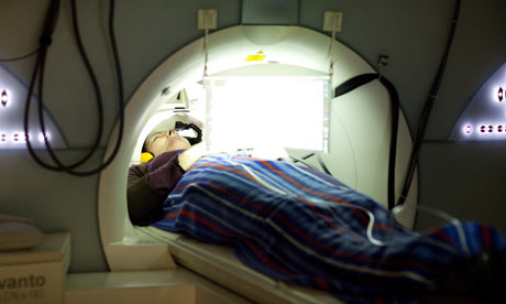 mri brain scan. Volunteers lay in an MRI brain